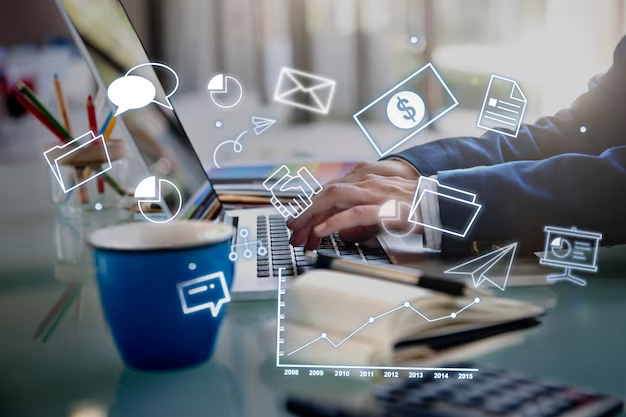 Man working at a laptop, financial elements in the foreground