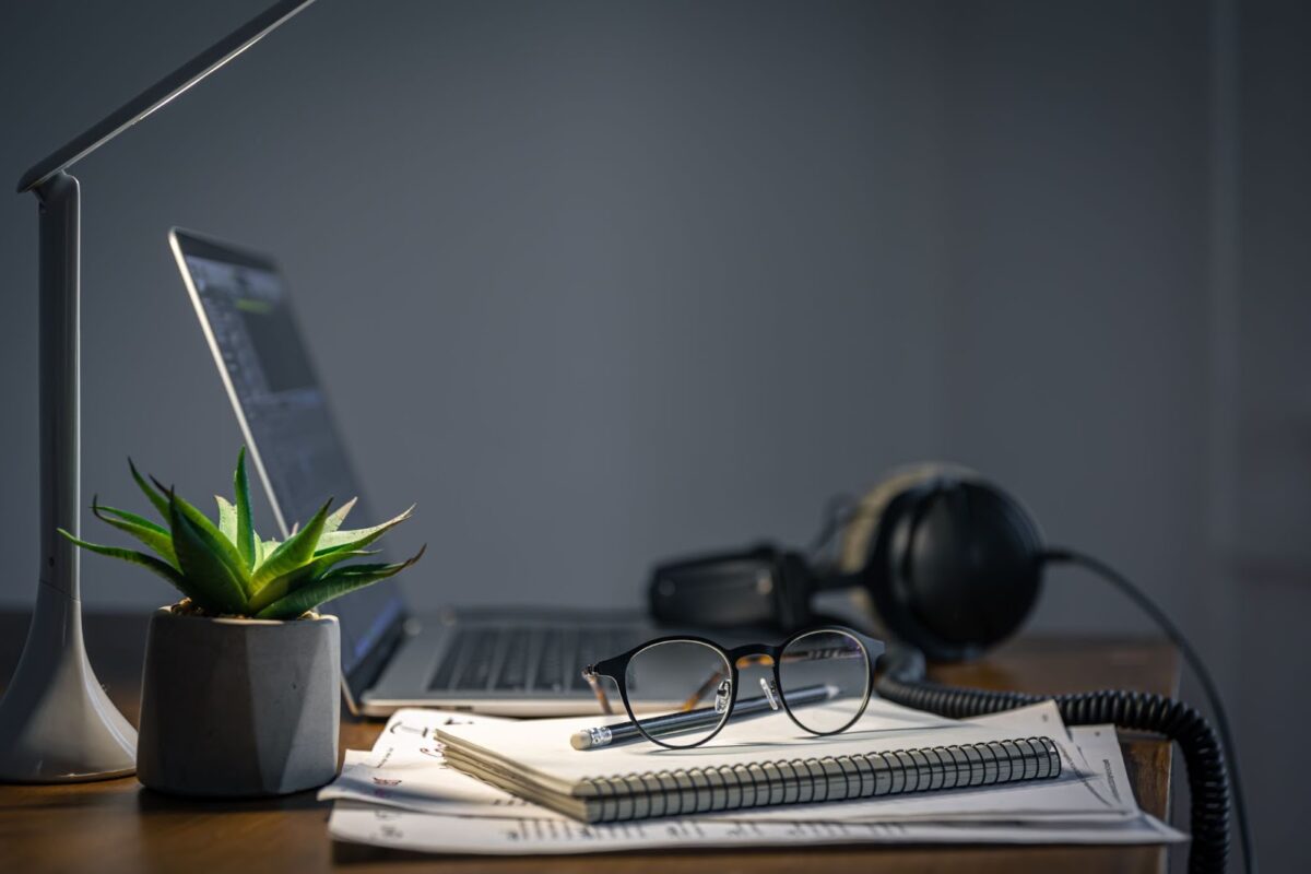 Workplace with headphones and laptop